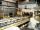 Photos #7 - WEMHONER, "4x18", Melamine Press Line, PF-010311: WEMHONER, 4x18, melamine, press, thermofused, laminates, MDF, particle board, platen, board infeed, paper layup, outfeed, trimming, stacking